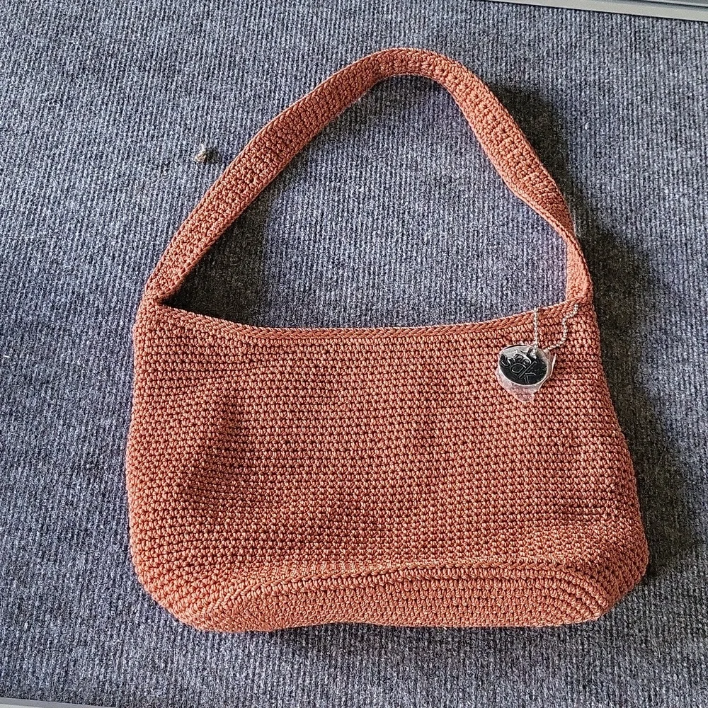 The SAK Burnt Orange Crochet Shoulder Bag​​